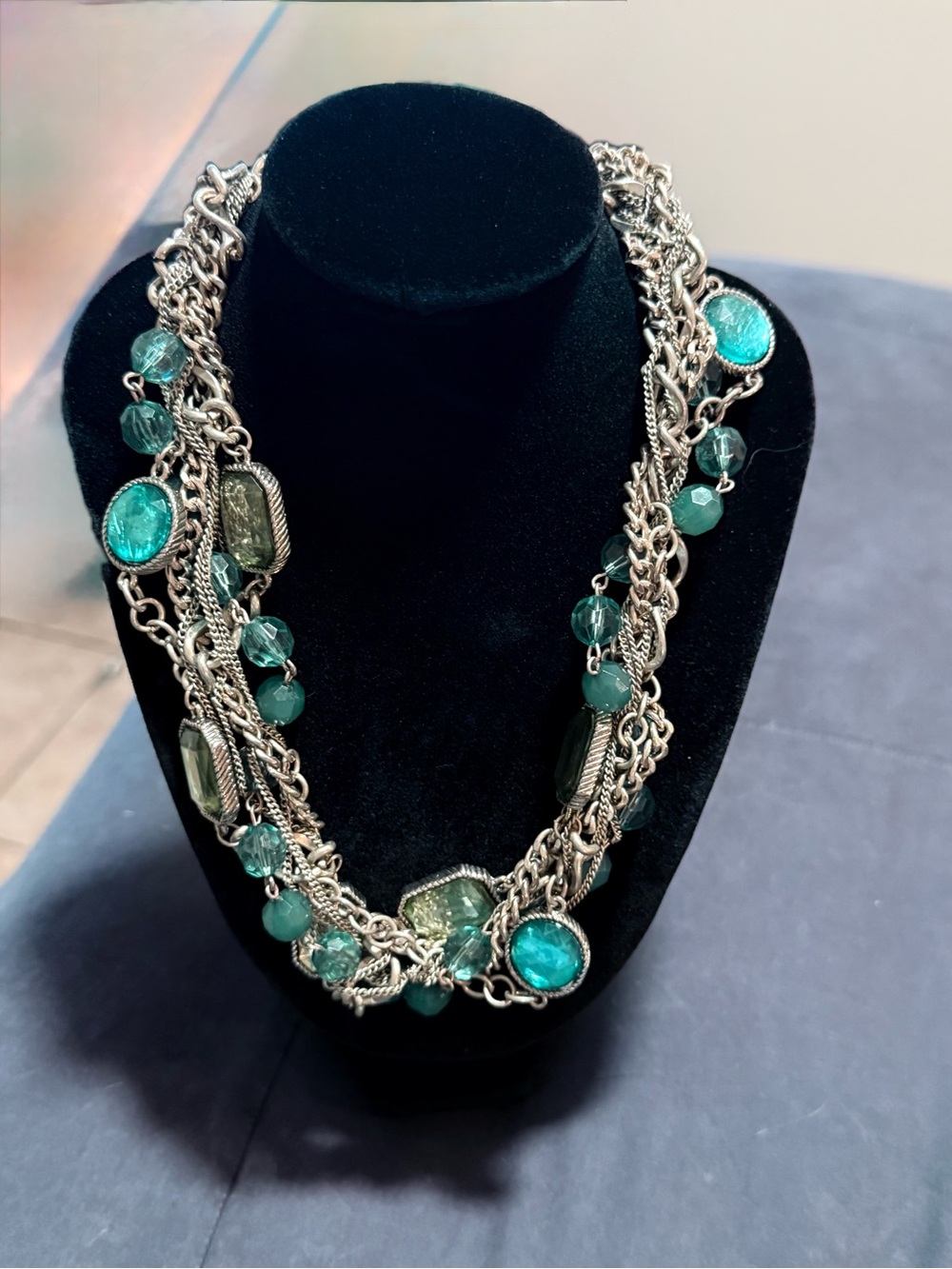 Layered Silver Necklace with Teal Gem Accents